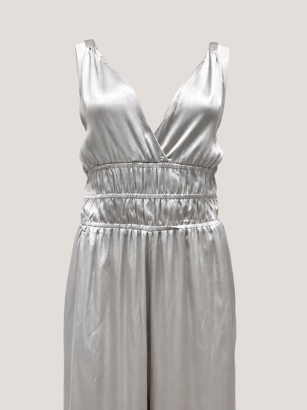Zilveren, zijde jumpsuit van het Italiaanse merk Semicouture