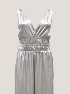 Zilveren, zijde jumpsuit van het Italiaanse merk Semicouture