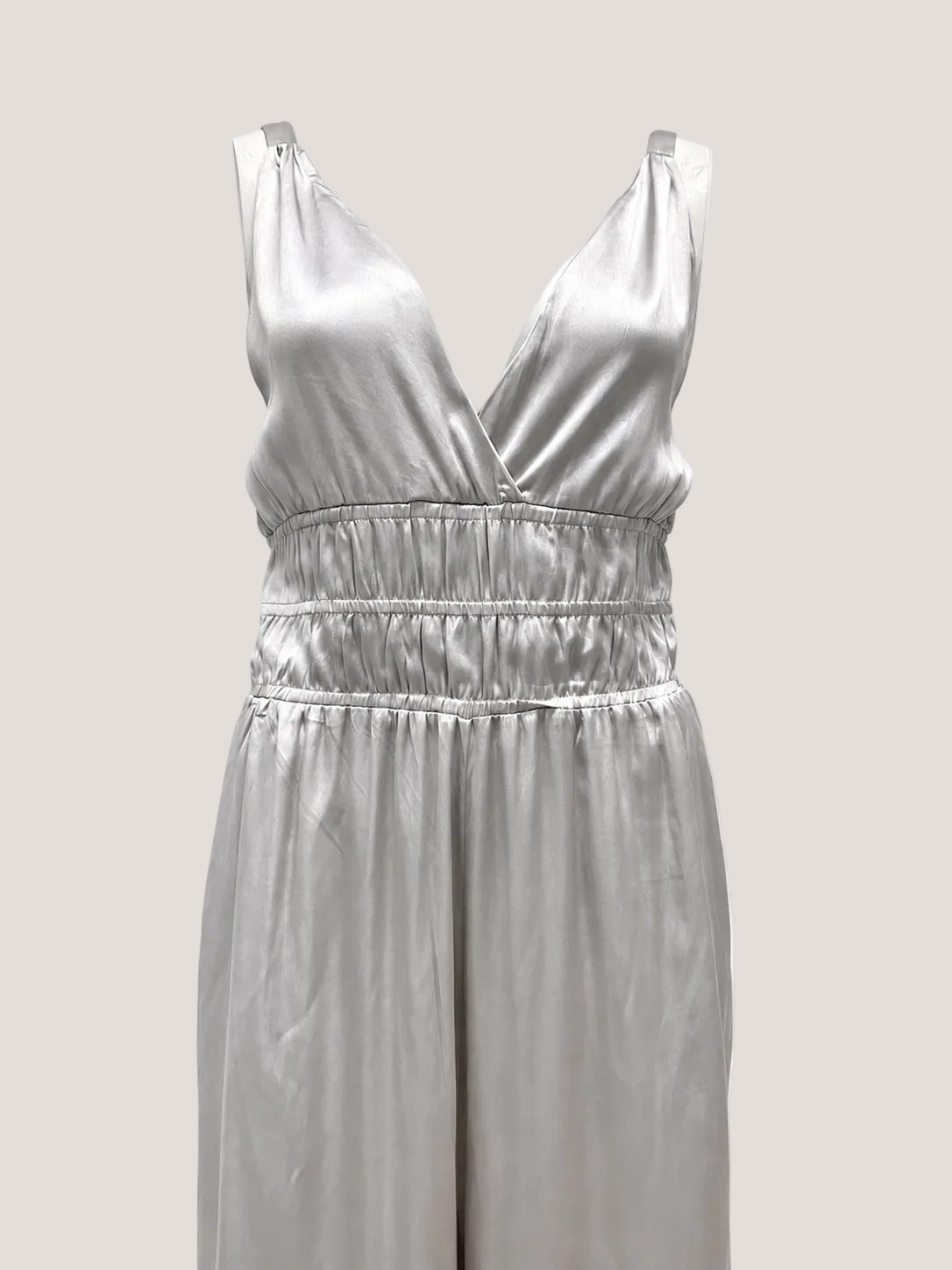 Zilveren, zijde jumpsuit van het Italiaanse merk Semicouture