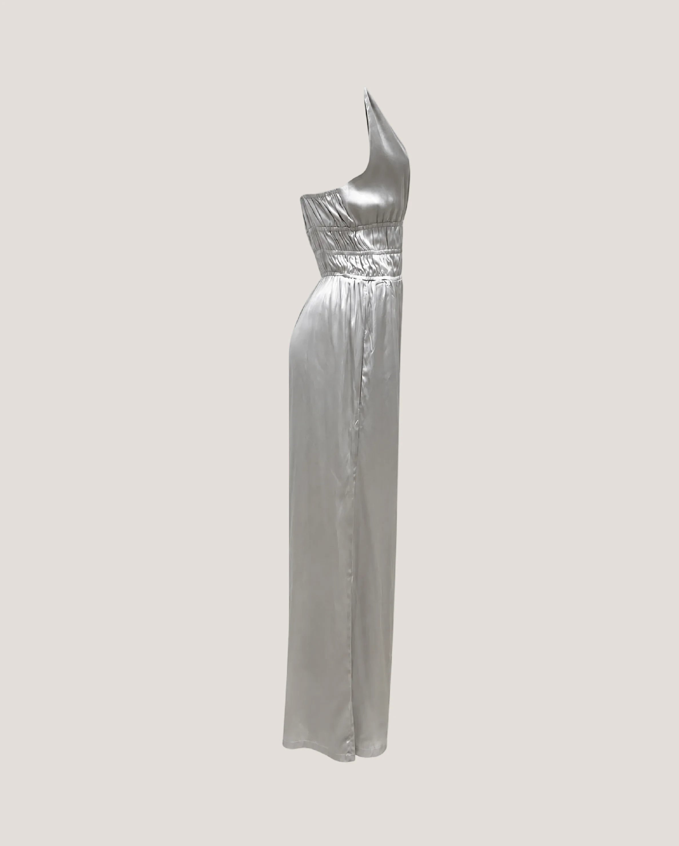 Zilveren, zijde jumpsuit van het Italiaanse merk Semicouture