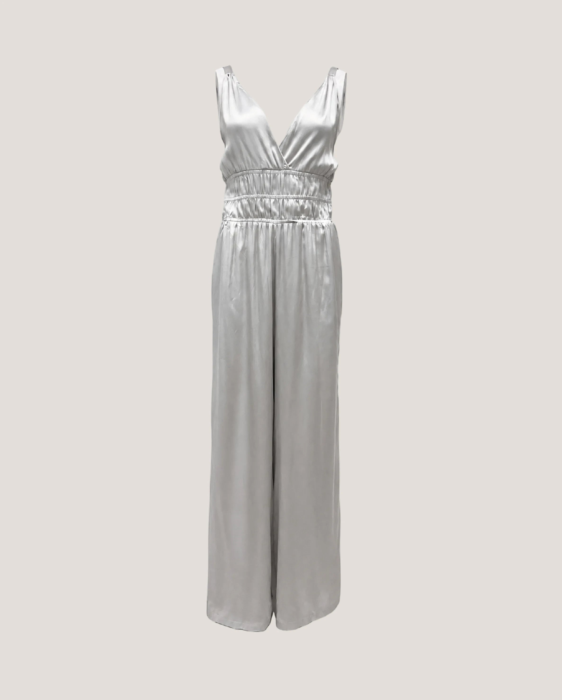 Zilveren, zijde jumpsuit van het Italiaanse merk Semicouture